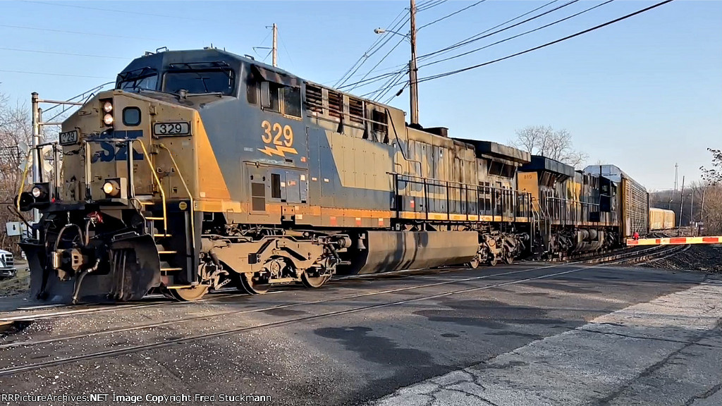 CSX 329 leads M217.